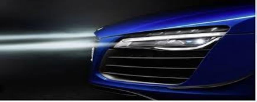 Discuss the advancements in automotive lighting technology, including LED and adaptive lighting systems